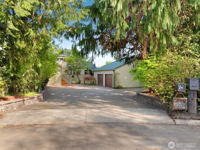 view of front facade featuring a garage and concrete driveway