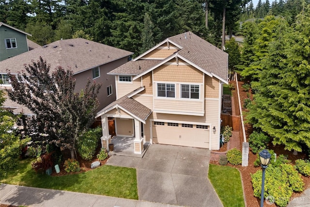 4000 Cameron Dr NE, Lacey, WA 98516 - craftsman inspired home with an attached garage, driveway, a shingled roof, a porch, and a front yard