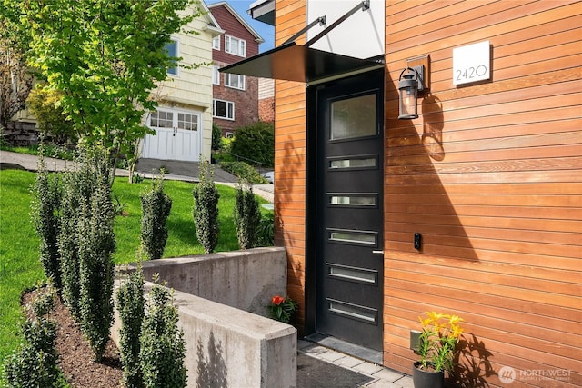 property entrance with a garage