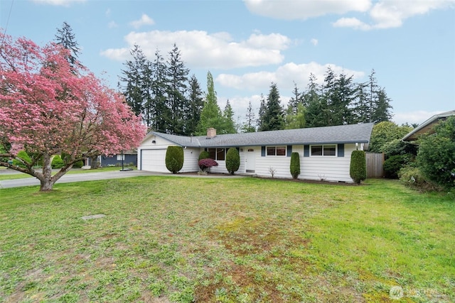 single story home with fence, a front lawn, a garage, a chimney, and driveway
