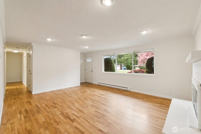 unfurnished living room with crown molding, a baseboard radiator, a brick fireplace, and light wood finished floors
