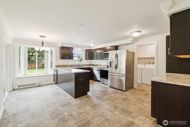 kitchen with an inviting chandelier, dark brown cabinetry, baseboard heating, separate washer and dryer, and stainless steel appliances