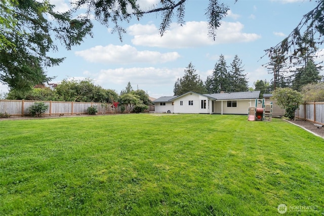 view of yard featuring a fenced backyard