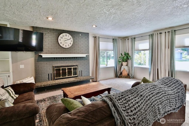 70 Shadow Trl, Sequim, WA 98382 - carpeted living room featuring a fireplace and a textured ceiling
