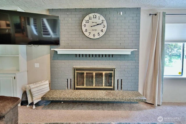 70 Shadow Trl, Sequim, WA 98382 - room details with a fireplace, a textured ceiling, and carpet flooring