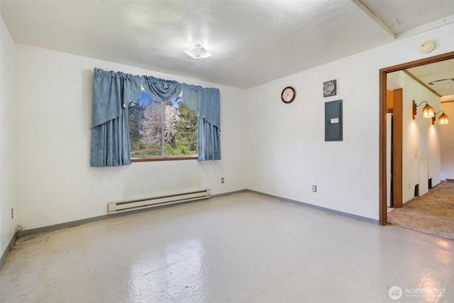 spare room featuring baseboards, electric panel, concrete floors, and a baseboard radiator