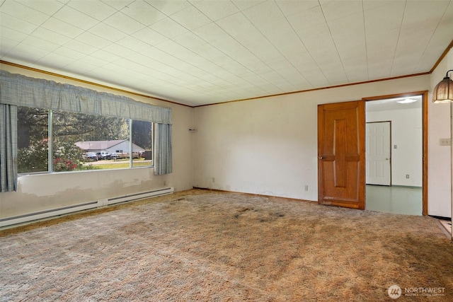 carpeted spare room featuring ornamental molding and baseboard heating