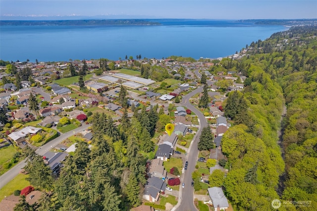 birds eye view of property featuring a residential view and a water view