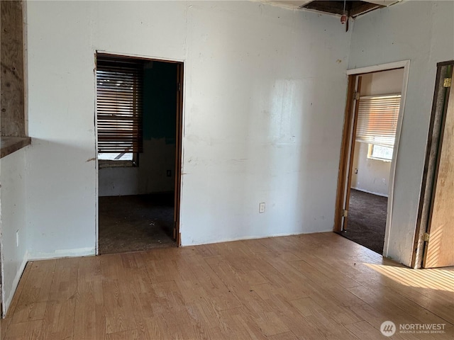 unfurnished room featuring wood finished floors
