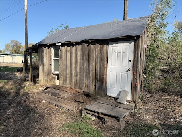view of outbuilding with an outdoor structure