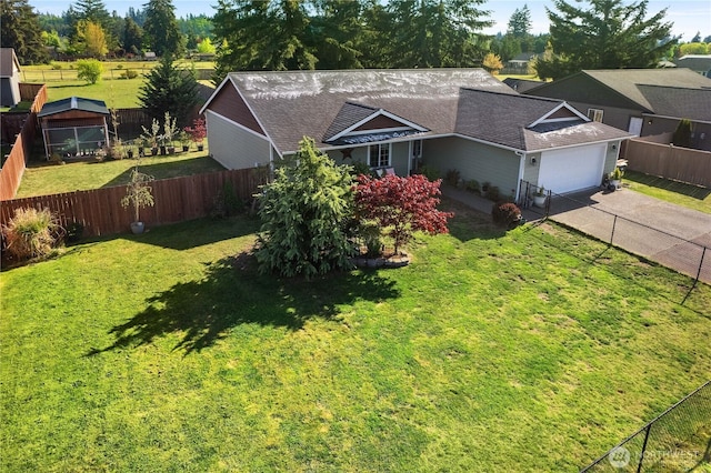 9321 179th Ln SW, Rochester, WA 98579 - view of front of home with driveway, a garage, and roof with shingles