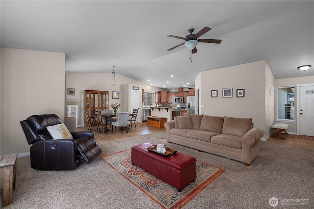9321 179th Ln SW, Rochester, WA 98579 - living room featuring lofted ceiling, ceiling fan, baseboards, recessed lighting, and light colored carpet