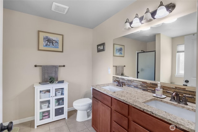 9321 179th Ln SW, Rochester, WA 98579 - bathroom with a stall shower, tile patterned flooring, toilet, backsplash, and baseboards