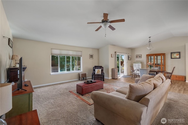 9321 179th Ln SW, Rochester, WA 98579 - carpeted living area with healthy amount of natural light, a ceiling fan, lofted ceiling, and baseboards