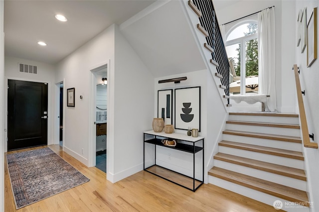 909 11th St, Mukilteo, WA 98275 - entryway with stairway, visible vents, baseboards, recessed lighting, and wood finished floors
