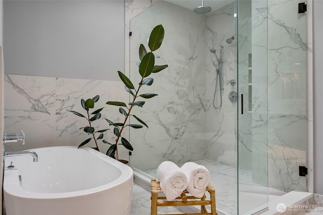 909 11th St, Mukilteo, WA 98275 - full bath featuring a marble finish shower, marble finish floor, tile walls, and a soaking tub