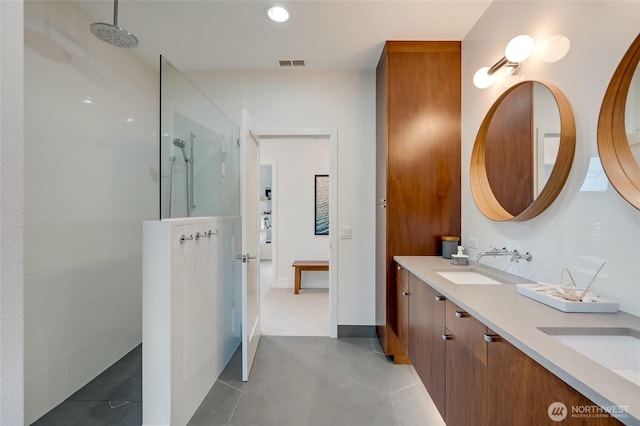909 11th St, Mukilteo, WA 98275 - full bathroom featuring double vanity, a sink, a walk in shower, and visible vents