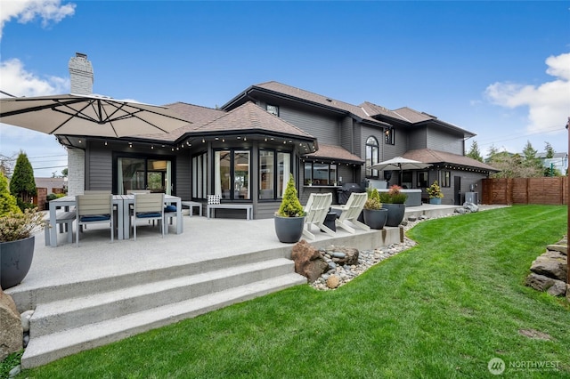 909 11th St, Mukilteo, WA 98275 - rear view of property with fence, a chimney, a patio area, and a yard
