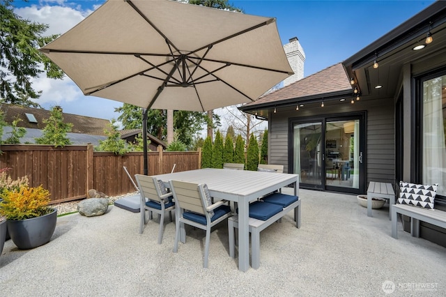 909 11th St, Mukilteo, WA 98275 - view of patio / terrace featuring outdoor dining area and fence