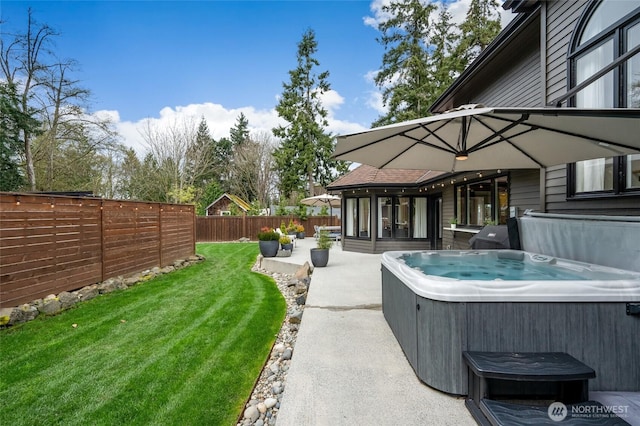 909 11th St, Mukilteo, WA 98275 - view of yard with a patio area, a fenced backyard, and a hot tub