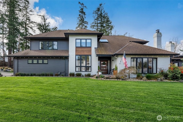 909 11th St, Mukilteo, WA 98275 - prairie-style house featuring a front lawn, roof with shingles, brick siding, and a chimney