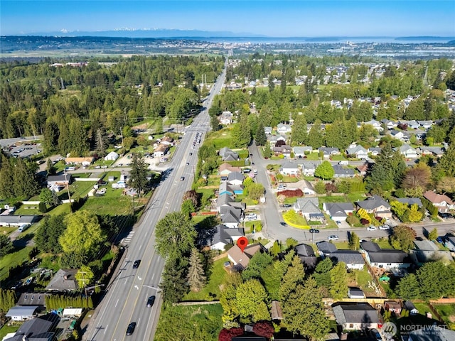 birds eye view of property with a residential view