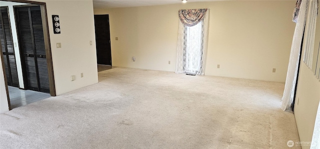 unfurnished bedroom featuring carpet