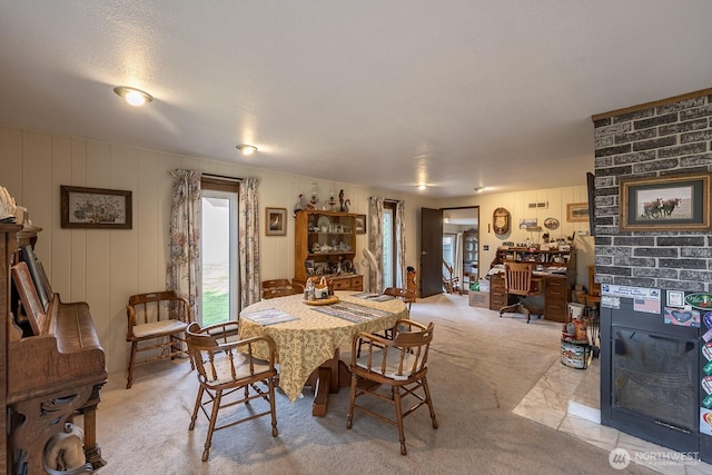 dining room featuring light colored carpet