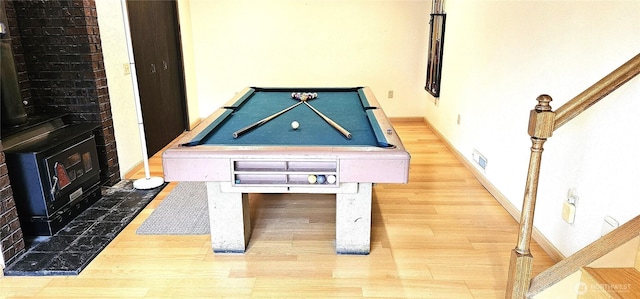 playroom with billiards, wood finished floors, and baseboards