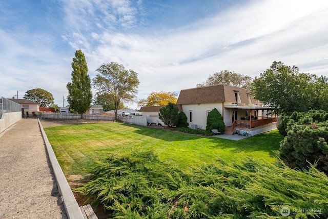view of yard featuring fence