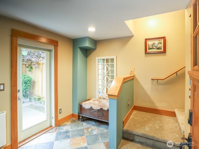 interior space featuring baseboards and radiator heating unit