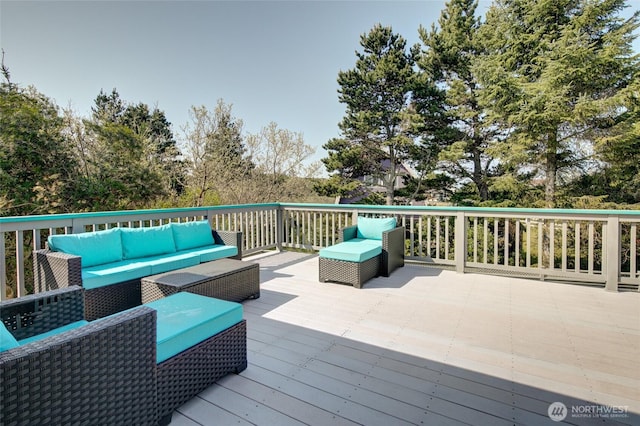 wooden deck with an outdoor hangout area