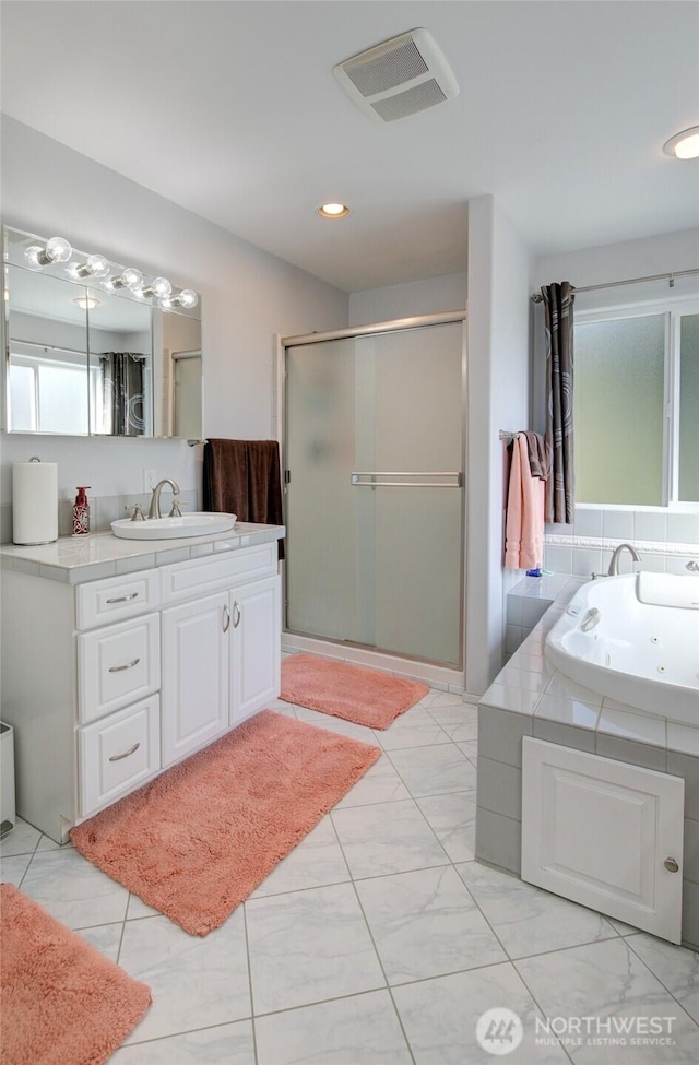 full bathroom with recessed lighting, vanity, a whirlpool tub, a stall shower, and visible vents