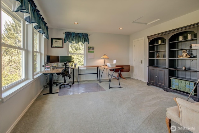 carpeted office featuring a healthy amount of sunlight, recessed lighting, and baseboards