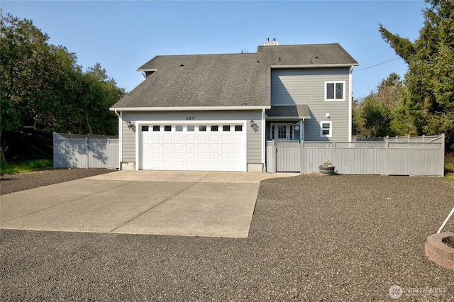 view of front of house with a chimney, driveway, roof with shingles, an attached garage, and fence