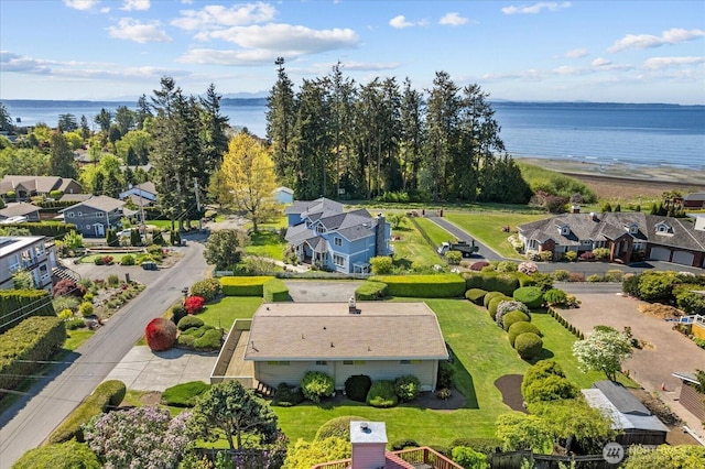aerial view with a residential view and a water view