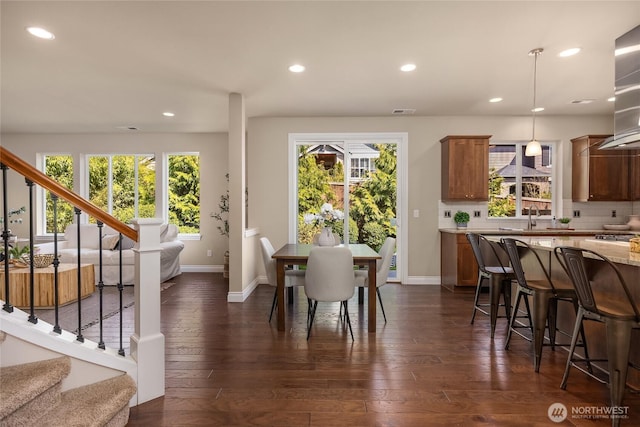 dining space with recessed lighting, stairs, and a wealth of natural light
