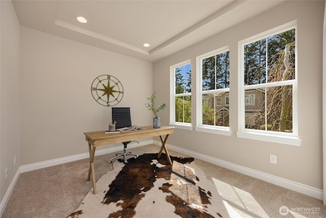 office area with baseboards, recessed lighting, carpet, and a raised ceiling
