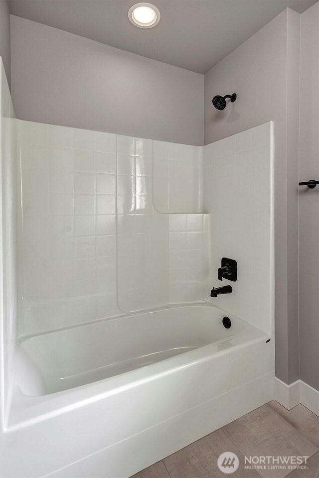 1343 211th Ave NE, Sammamish, WA 98074 - bathroom with washtub / shower combination, tile patterned floors, and recessed lighting