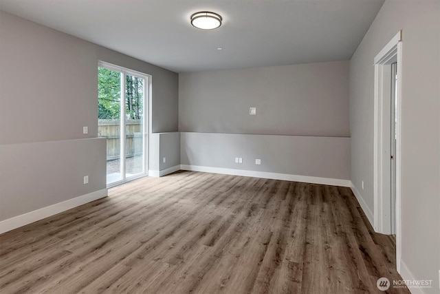 1343 211th Ave NE, Sammamish, WA 98074 - unfurnished room with wood finished floors and baseboards