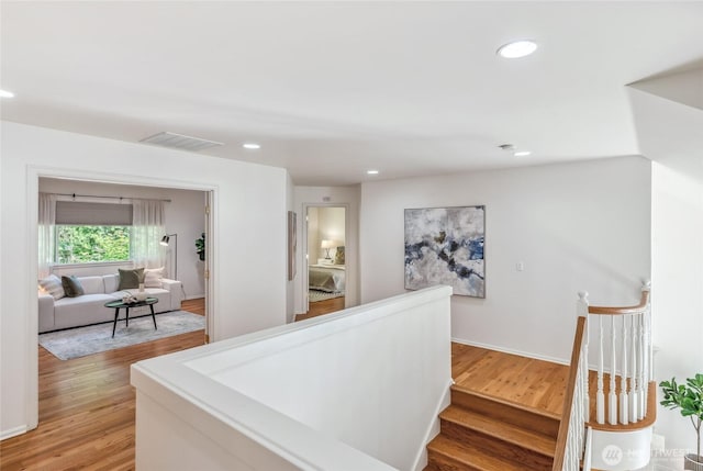 16639 Northup Way, Bellevue, WA 98008 - hall with recessed lighting and light wood-style flooring