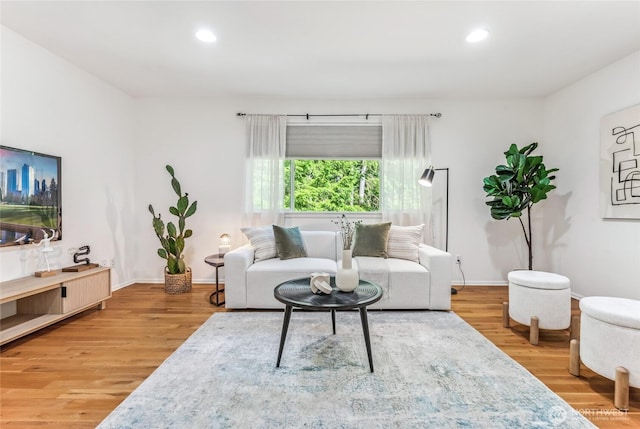 16639 Northup Way, Bellevue, WA 98008 - living area featuring light wood-style flooring and recessed lighting