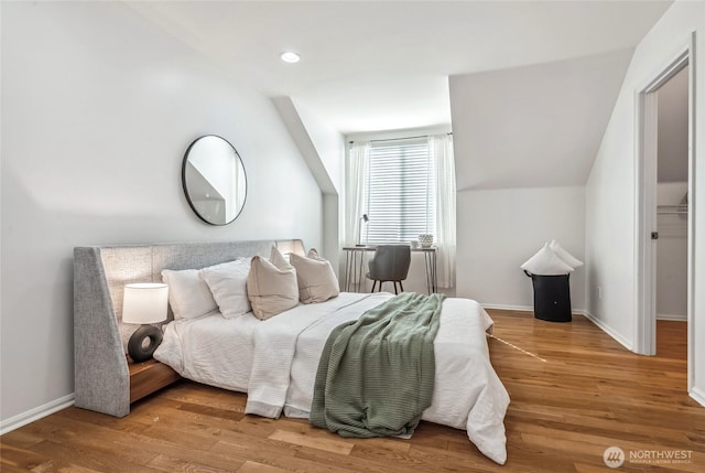 16639 Northup Way, Bellevue, WA 98008 - bedroom with wood finished floors and recessed lighting