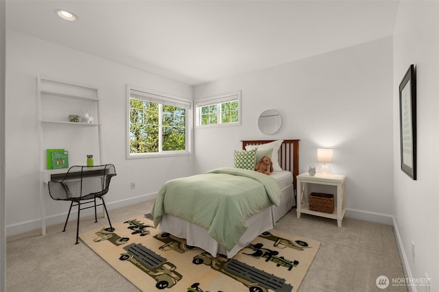 carpeted bedroom with baseboards