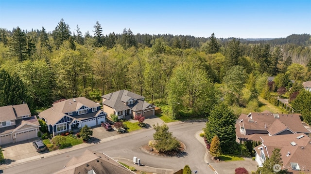 aerial view with a residential view and a forest view