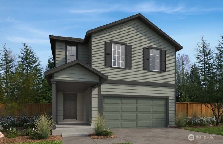 1502 NW Swenson Ct Unit 12, Poulsbo, WA 98370 - traditional-style home with fence, concrete driveway, and an attached garage