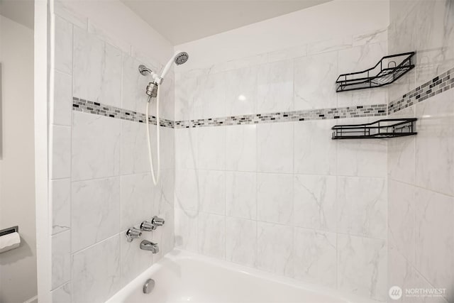bathroom with shower / bath combination