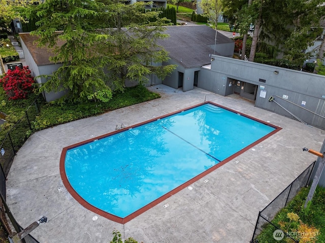 community pool featuring a patio