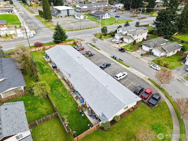 birds eye view of property with a residential view