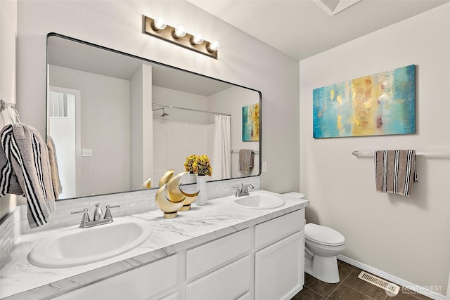 full bath featuring a sink, baseboards, toilet, and visible vents